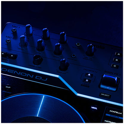 Close-up of a Denon DJ mixing controller under dramatic blue lighting, showing knobs, buttons, and a jog wheel on a dark background.